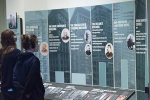 Volunteers engaging patrons of the museum